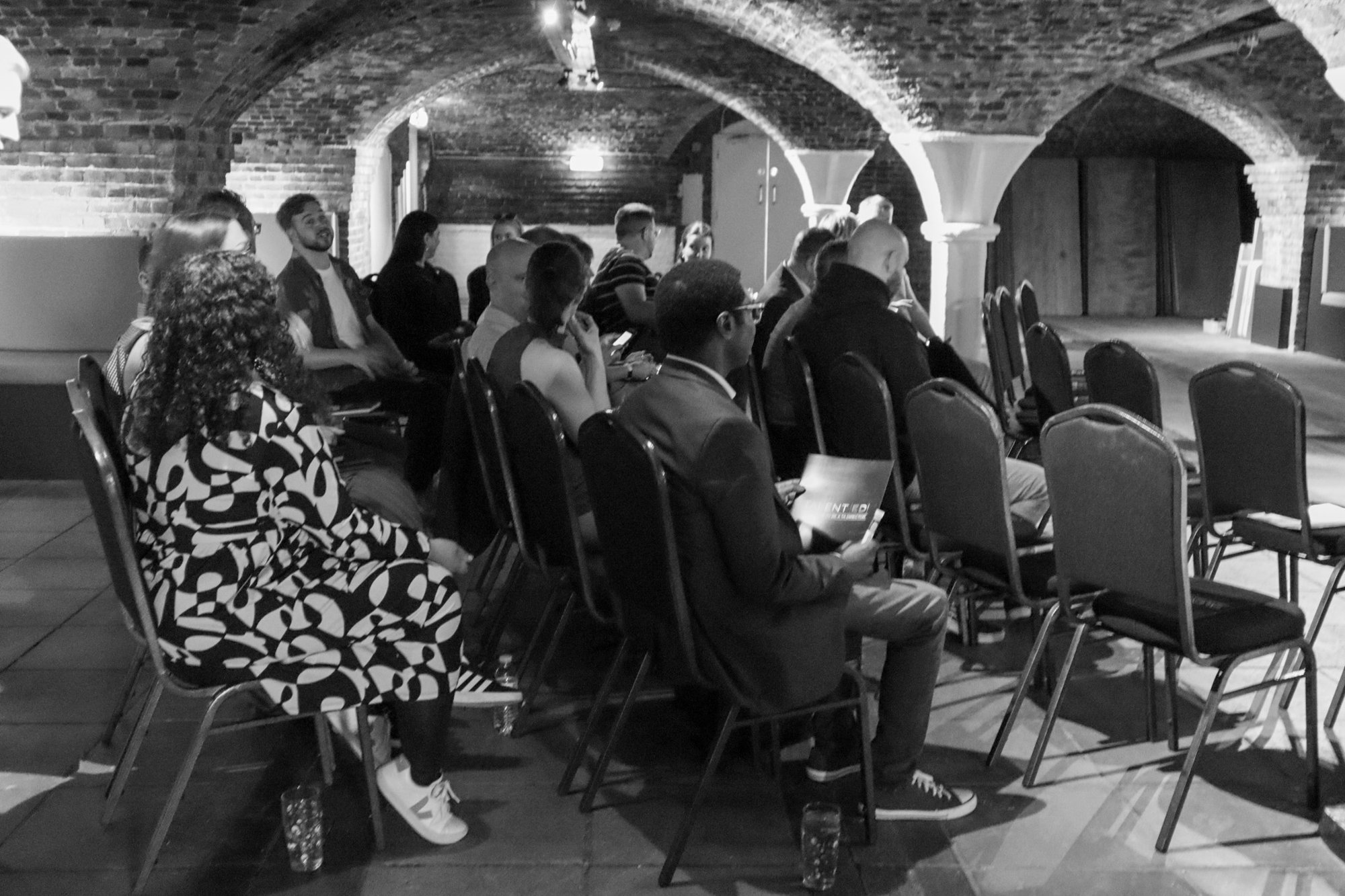 Rows of attendees enjoying the discussion